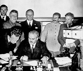 Molotov signing Molotov-Ribbentrop Nonaggression Pact, August 23–24, 1939