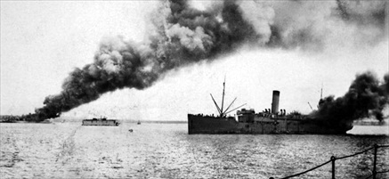 SS Zealandia and MV Neptuna burning in Darwin Harbor, February 19, 1942