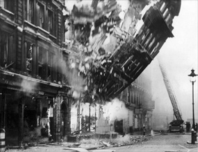 Falling façade, Queen Victoria St., London, May 10/11, 1941 Blitz