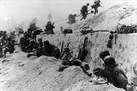 Operation Overlord: Moving out over the seawall on Utah Beach, June 6, 1944