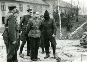 Ex-Auschwitz commandant Rudolf Hoess mounting gallows, Auschwitz, April 16, 1947