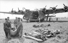Wounded soldiers being loaded into a Messerschmitt Me 323, Italy, March 1943