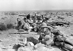 Operation Crusader: Italian infantrymen smile for Rommel in North Africa, 1941