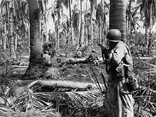 Battle of Leyte: U.S. infantrymen cautiously advance on a machine-gun nest on Leyte