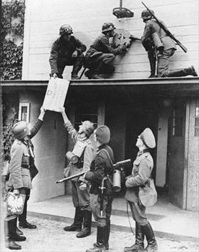 Removing Polish insignia, Sopot, September 1, 1939