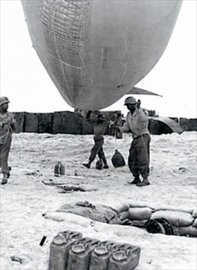 320th Barrage Balloon Battalion: Omaha Beach barrage balloon being readied for flight