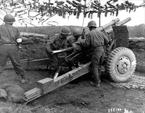 442nd’s 522nd Field Artillery Battalion fire 105mm shells 
