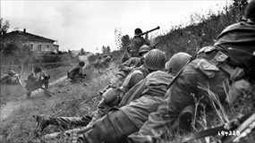 Buffalo soldiers pound German enemy positions north of Lucca, Italy, September 7, 1944