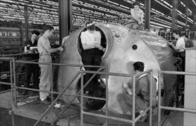 Crew working on B-29 pressurized cockpit section