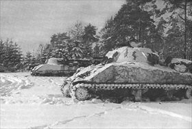 Ardennes Offensive: M4 Sherman tanks near St. Vith, December 1944