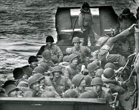 Offloading soldiers into a Higgins boat, June 6, 1944