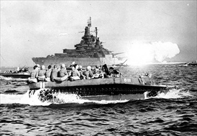 A Landing Vehicle Tracked (LVT) Water Buffalo carries U.S. troops to Okinawa&rsquo;s invasion beaches, April 1, 1945
