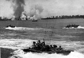 Battle of Peleliu: Marines aboard amtraks on way to Peleliu beach, 9/15/44