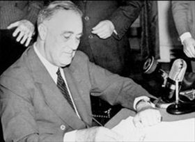 Steps Strengthening U.S. Defense Posture: Roosevelt signing the Selective Service Act, 1940