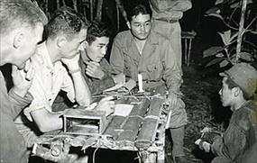 MIS interrogators Phil Ishio and Arthur Ushiro question prisoner, Papua New Guinea, January 2, 1943