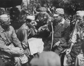 MIS graduate Lt. Pat Neishi discussing surrender terms, Philippines, February/March 1945