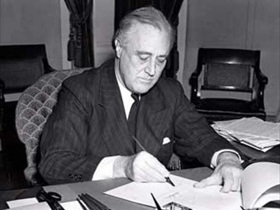 Roosevelt signing Lend-Lease Bill, March 11, 1941