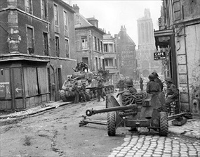 Capturing Caen: Antitank gun, 2 Shermans, and men of British 3rd Division Capturing Caen: Antitank gun, 2 Shermans, and men of British 3rd Division