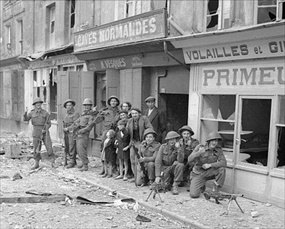 Capturing Caen: British soldiers meet bombing survivors Capturing Caen: British soldiers meet bombing survivors