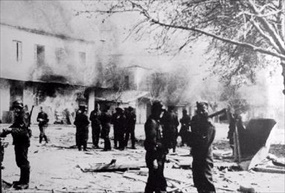 Greek Holocaust: German troops in front of buildings set ablaze in Distomo, June 10, 1944