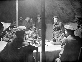 German unconditional surrender: Montgomery reading the text of surrender document to Germans, May 4, 1945 German unconditional surrender: Montgomery reading the text of surrender document to Germans, May 4, 1945